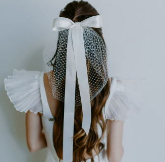adding a bow to your hair